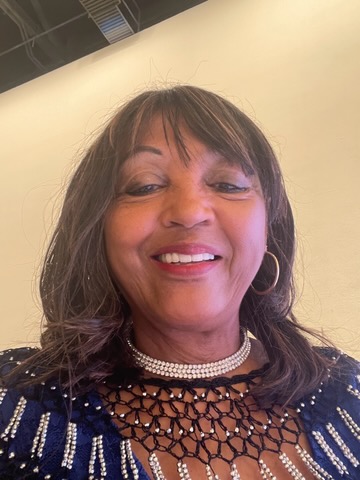 Regina Ross smiling for a campaign selfie